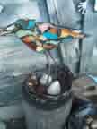 Scrap Bird in Nest 100